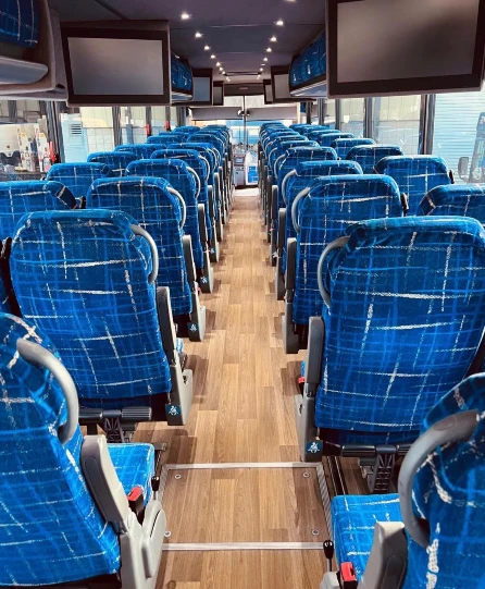 Reclining seats and overhead screens